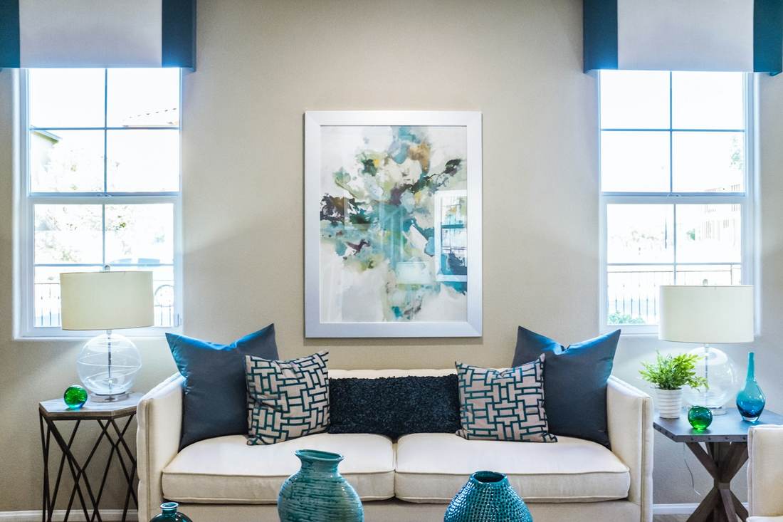 A quiet bedroom with neutral linens